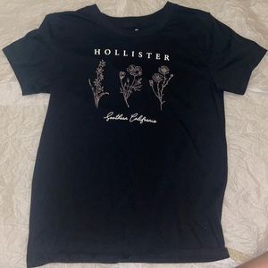 Hollister: Basic black top with simplistic design.
